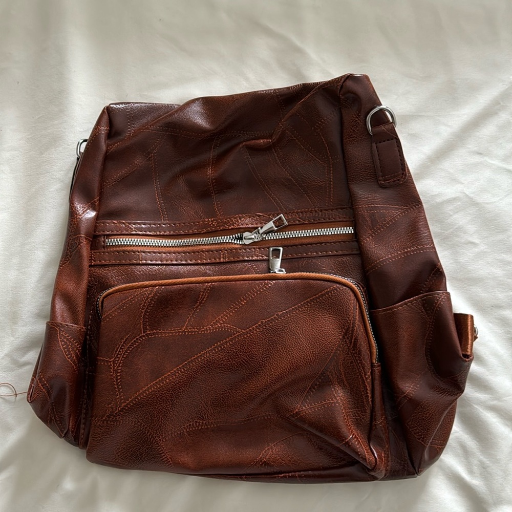 New brown leather backpack